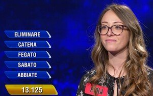 L’Eredità, si brinda da Flavio Insinna: la campionessa Paola conquista un bel bottino