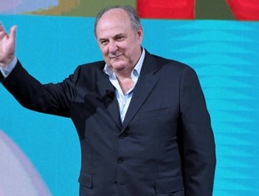 Gerry Scotti co-conduttore Sanremo 2025! Perché lo merita e colpo di Conti